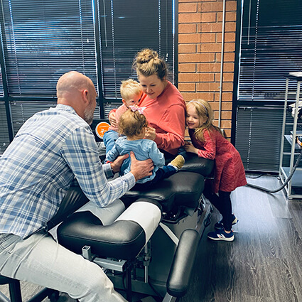 doc-adjusting-mom-and-kids