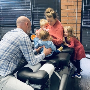 family in Chiropractic office