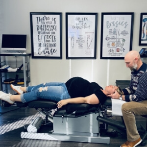 pregnant woman getting adjusted