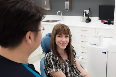 patient smiling in dental chair