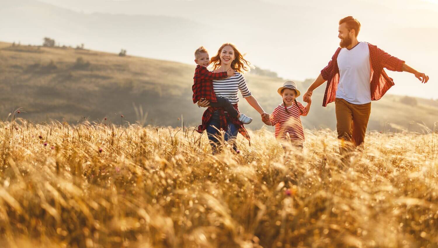 Family running in the field