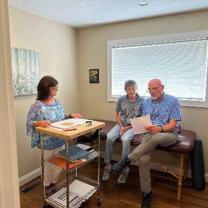 Dr. Cooper in consultation with patient