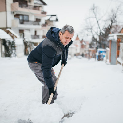 man shovelling snow