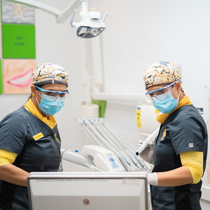 Dentist working on patient