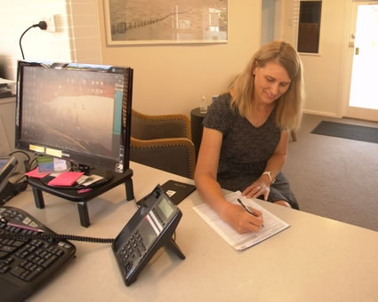 Woman completing forms