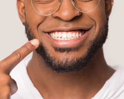 Man wearing glasses smiling