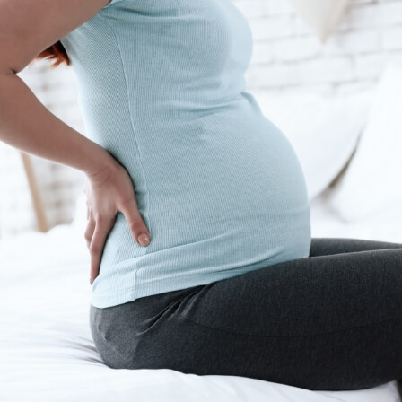 Pregnant lady wearing blue top