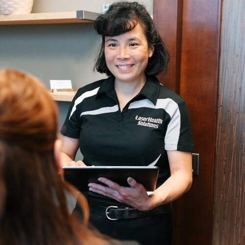 Chiropractor in consultation with a patient
