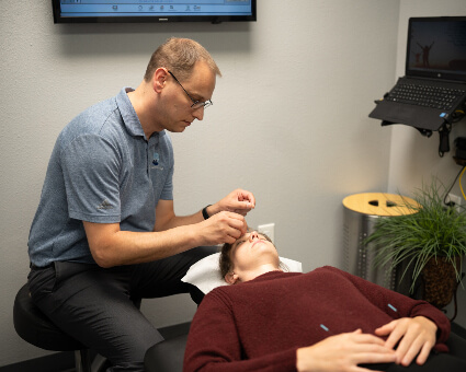 Applying acupuncture to head