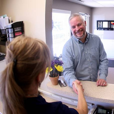 Man at reception desk