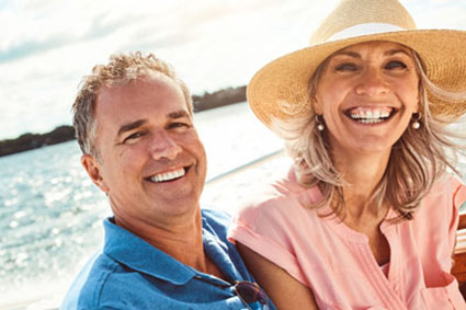 smiling couple on a boat