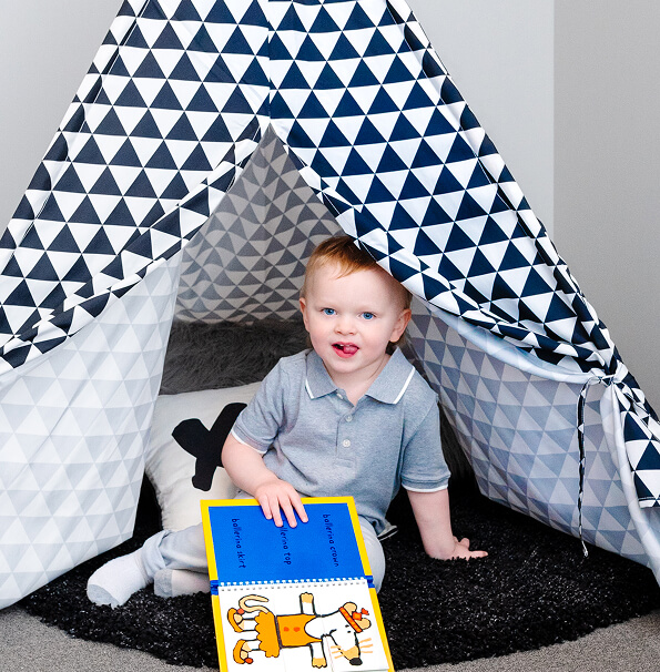 Child sitting in Parascak Family Chiropractic play area