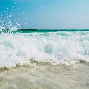 Beach with waves of water