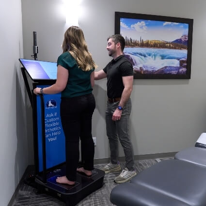 patient having feet scanned