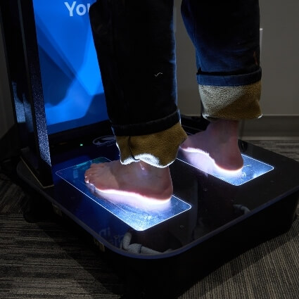 patient having feet scanned