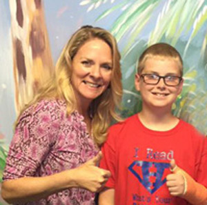 Dr. Anna Saylor with a young patient