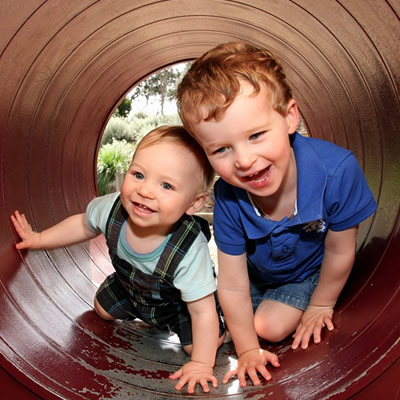 boys siblings playing