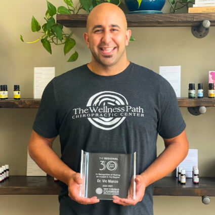 The Wellness Path Chiropractor Holding award