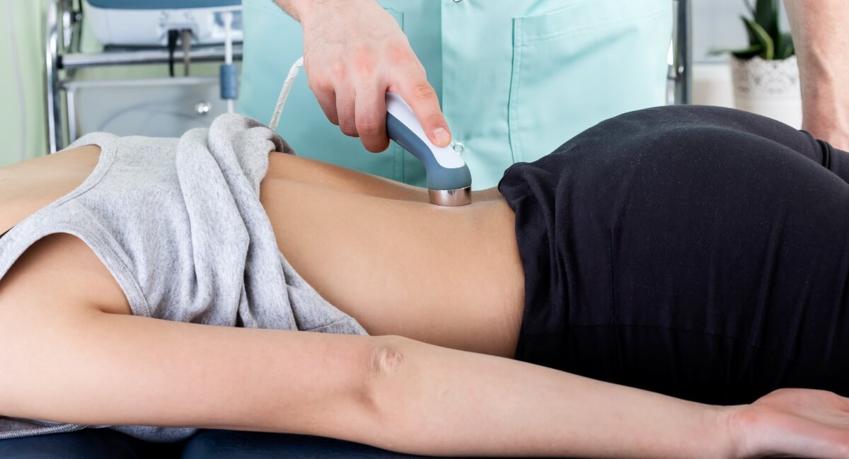 Cold laser therapy used to treat patient's back