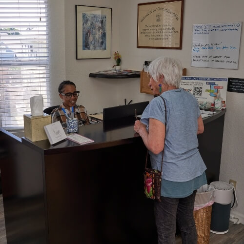 Oakland patient checking in at reception