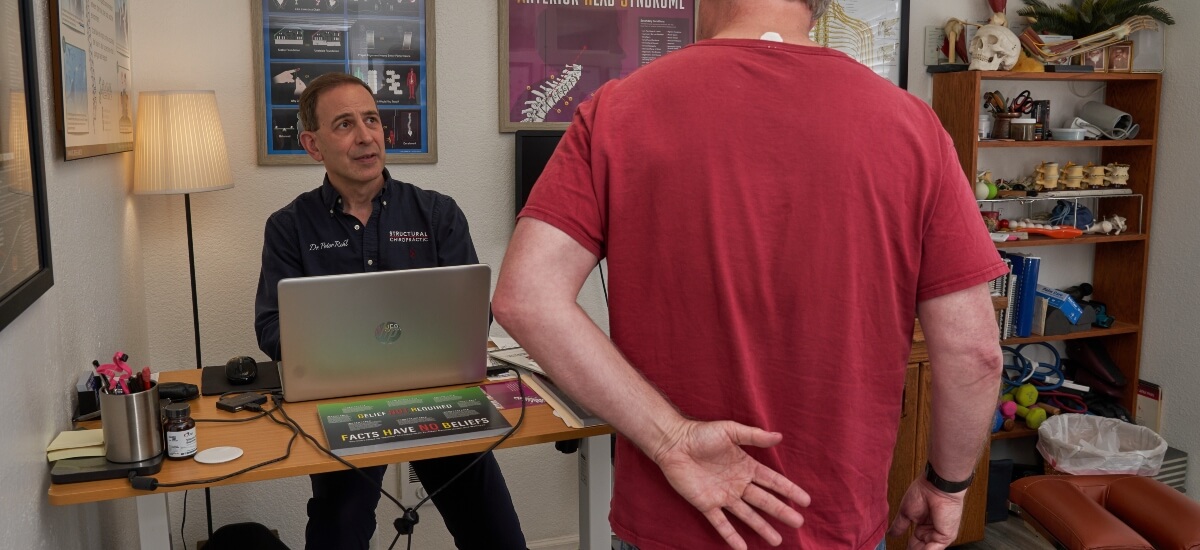 Patient in a chiropractic consultation