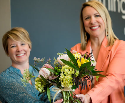 Dr. Brooke and Dr. Leah with flowers