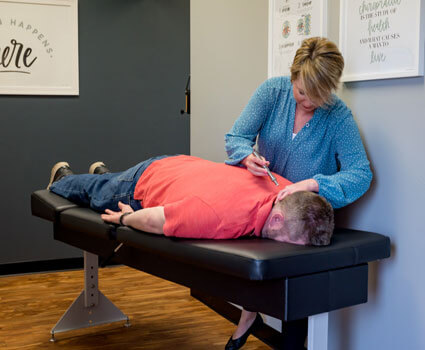 man getting adjusted