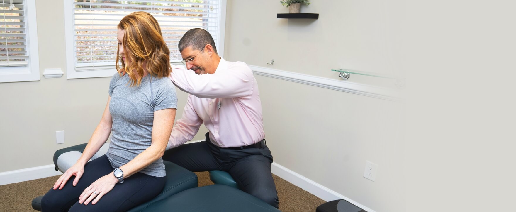 Dr. Shaye adjusting a patient's lower back