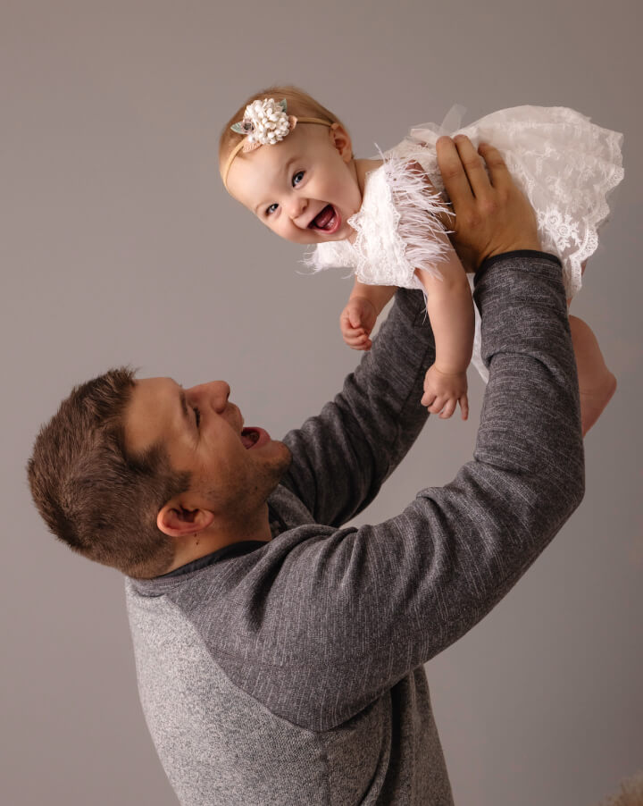 Chiropractor playing with baby