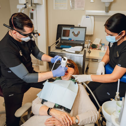 Working on dental patient