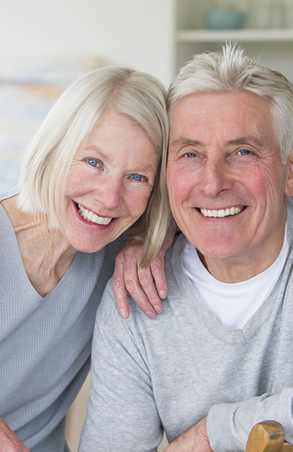 Mature couple smiling with nice white teeth