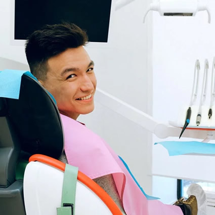 young man on dental chair