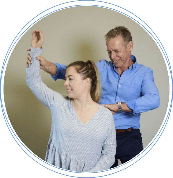 South Perth Chiropractic Centre chiropractor helping patient to lift arm