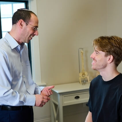 Dr Josh talking with a patient