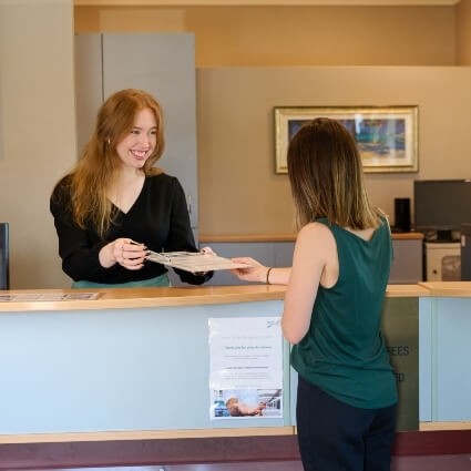 patient checking in at our front desk