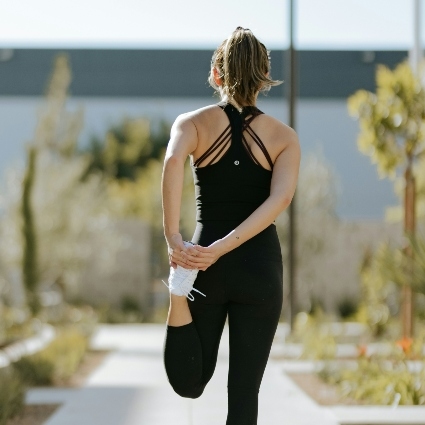 woman stretching before a run