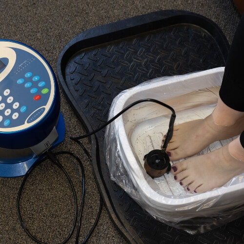Patiernt's feet in Ionic Foot Bath