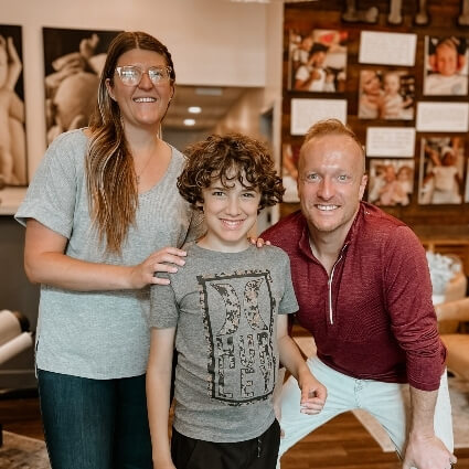 our doctors with a young boy
