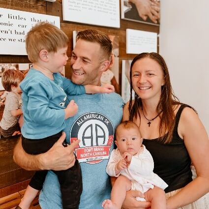 family at our testimonial wall