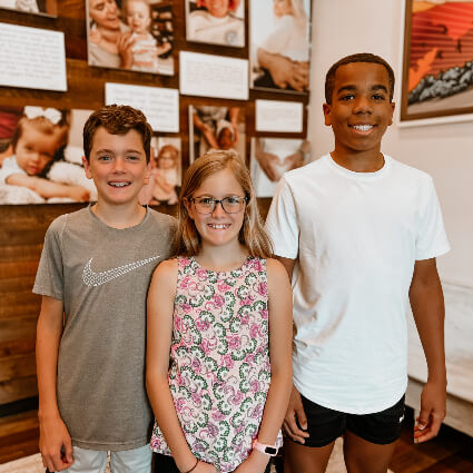 Smiling group of children at Trinity Life Center