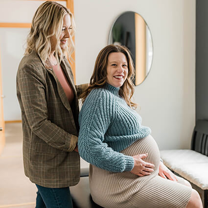 Dr Sharhae talking to pregnant patient