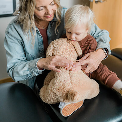 dr-sharhae-with-child-patient