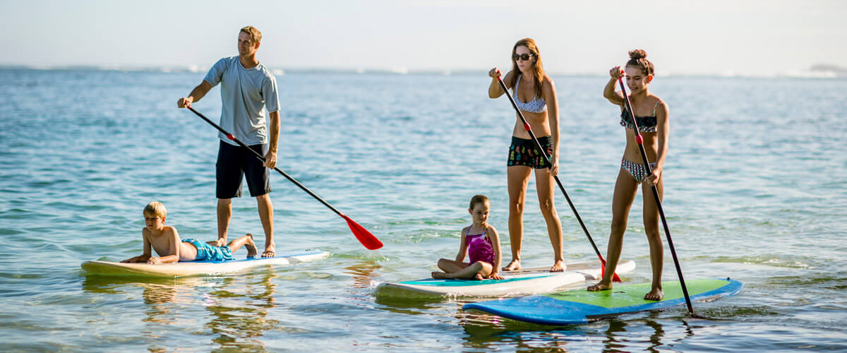 family paddleboarding