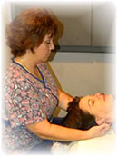 Photo of a Massage therapist at working on a client