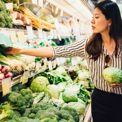 woman shopping for produce