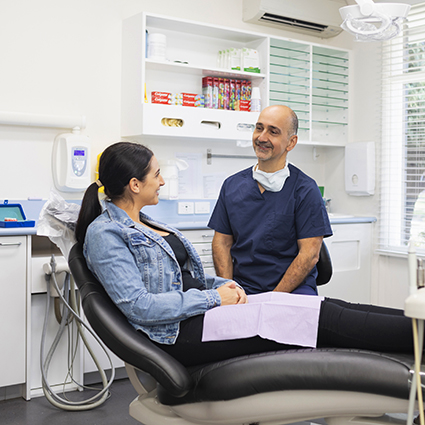 Dr George talking to patient