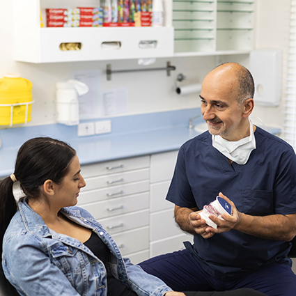 Dr. George discussing care with patient