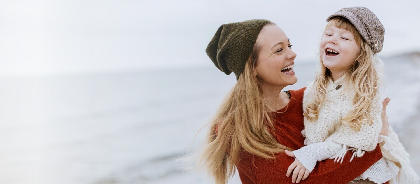 happy mom and kid laughing