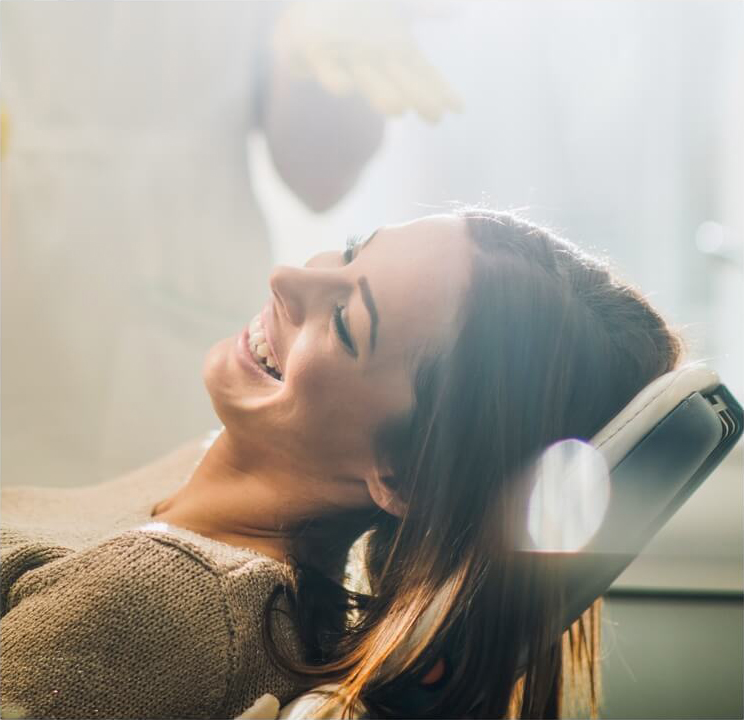 smiling person in dental chair