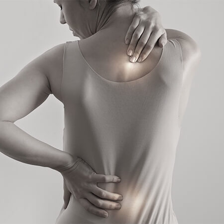 woman with neck and back pain